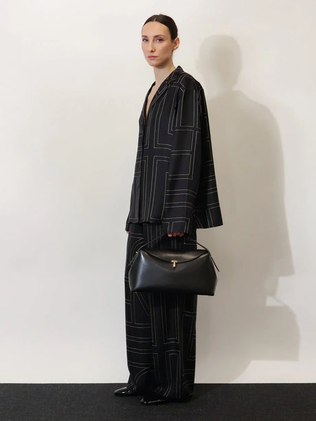 Toteme T-Lock leather crossbody bag - Black