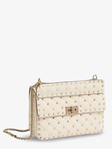 Valentino Garavani Rockstud Spike leather crossbody bag with iconic all-over studs - Lightivory