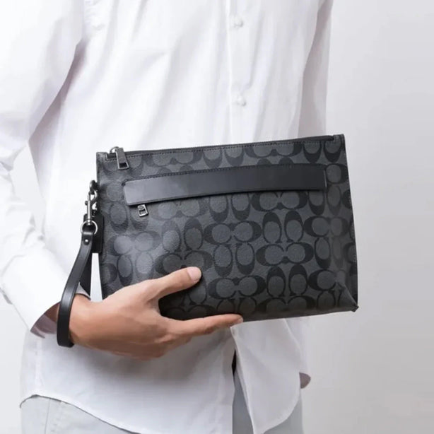 Coach carryall pouch in signature canvas best sale