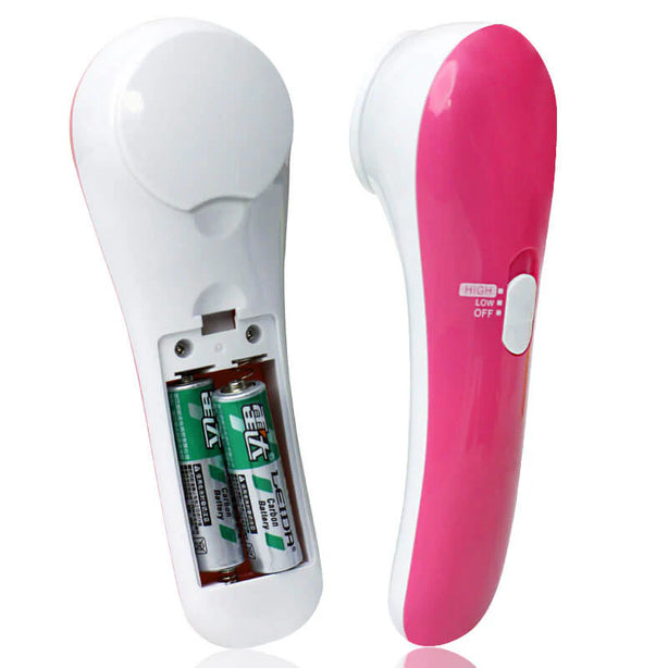 HANDHELD BATTERY-OPEARTED PET MASSAGER. FOR DRY AND WET USE.