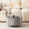 Round coffee table with storage basket