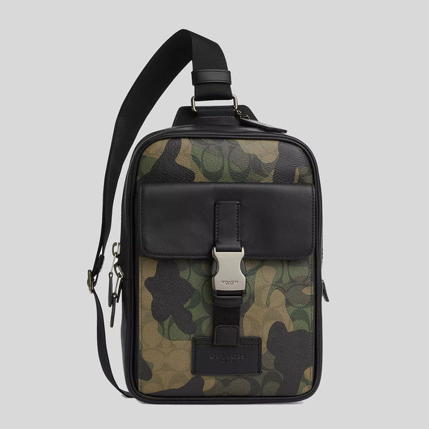 coach camouflage backpack men green multi Outlet West In Signature Camo Print Signature coated canvas and smooth calf leather Inside zip cell phone and multifunction pockets Inside tech sleeve Drawstring and speedclip closures fabric lining Top handle with 2 1/4 drop Outside zip and slip pockets Outside zip access to interior Adjustable shoulder straps 10 1/2 (L) x 16 1/2 (H) x 6 (W) Style No. COACH CW312 Men's West Pack