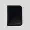 KATE SPADE Devin Glitter Edge Passport Holder Black KI622