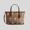 COACH Coach X Peanuts City Mini Tote Bag In Signature Canvas With Snoopy Print Tan/Brown Multi CBS83