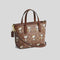 COACH Coach X Peanuts City Mini Tote Bag In Signature Canvas With Snoopy Print Tan/Brown Multi CBS83