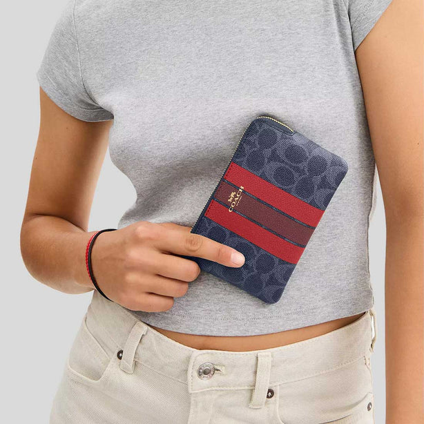 COACH Corner Zip Wristlet In Signature Canvas With Varsity Stripe Denim/Bold Red CBP19