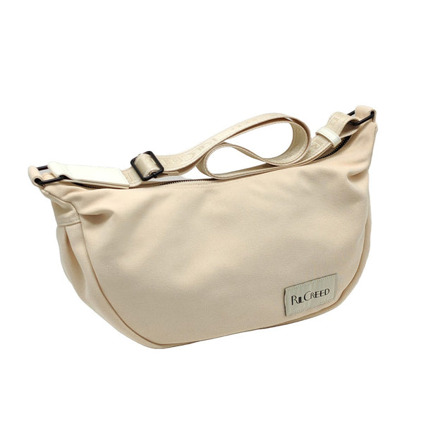 Ril Creed Canvas Crossbody Bag with main zip compartment
