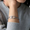Kate Spade Cut To The Chase Oval Spade Bangle Bracelet - Silver KM177
