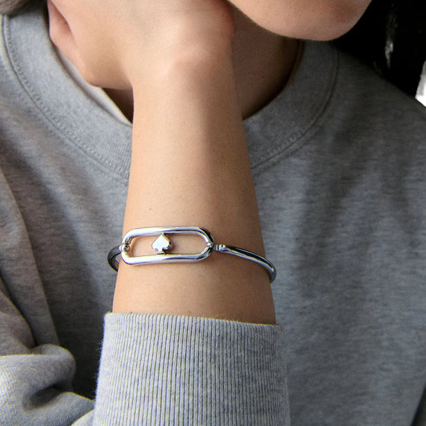 Kate Spade Cut To The Chase Oval Spade Bangle Bracelet - Silver KM177