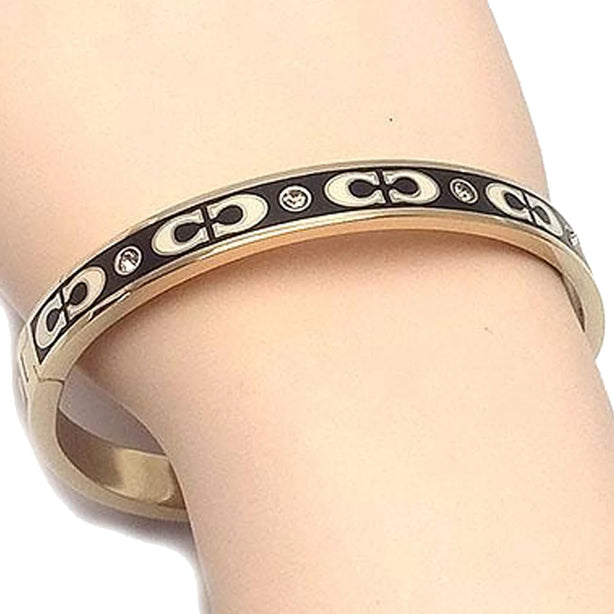 Coach Signature Enamel Hinged Bangle Bracelet in Gold/ Black CI904