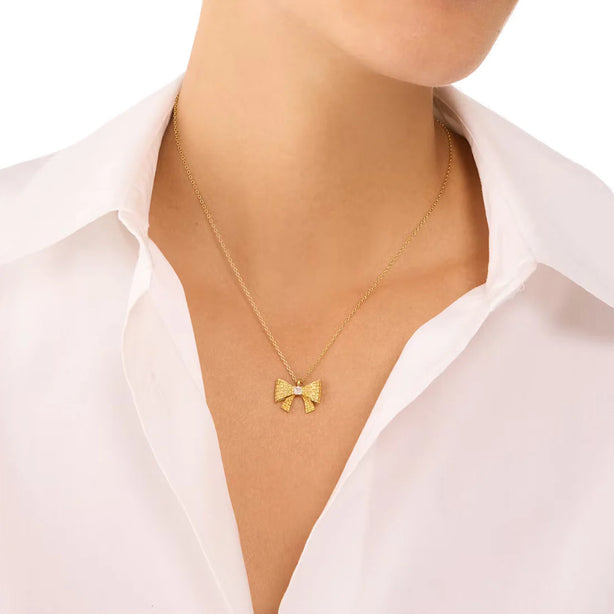 Kate Spade Wrapped In A Bow Mini Pendant Necklace in Clear/ Gold KJ974