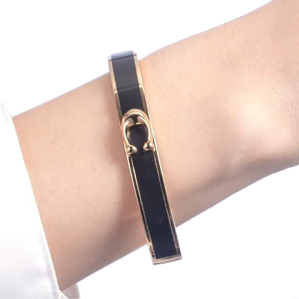 Coach Signature Push Hinged Bangle Bracelet in Gold/ Black F67480