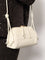 Bottega Veneta Concert Pouch leather crossbody bag with Intrecciato motif - Sea Salt-Gold