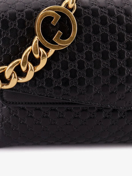 Gucci Leather crossbody bag with embossed GG motif - Black