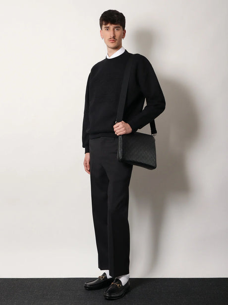 Gucci Leather GG Emblem crossbody bag with embossed GG motif - Black