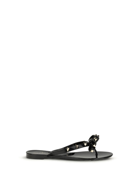 Valentino Garavani Rockstud flip-flop Sandals in PVC - Black