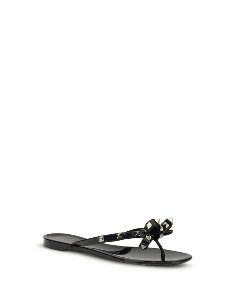 Valentino Garavani Rockstud flip-flop Sandals in PVC - Black