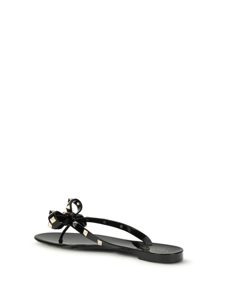 Valentino Garavani Rockstud flip-flop Sandals in PVC - Black