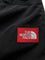 The North Face Nylon trousers with front logo patch - Black