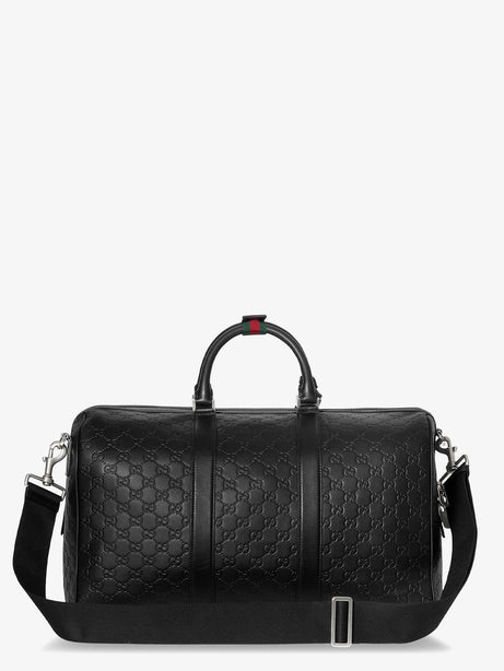 Gucci Coated canvas GG Emblem travel bag with GG motif - Black