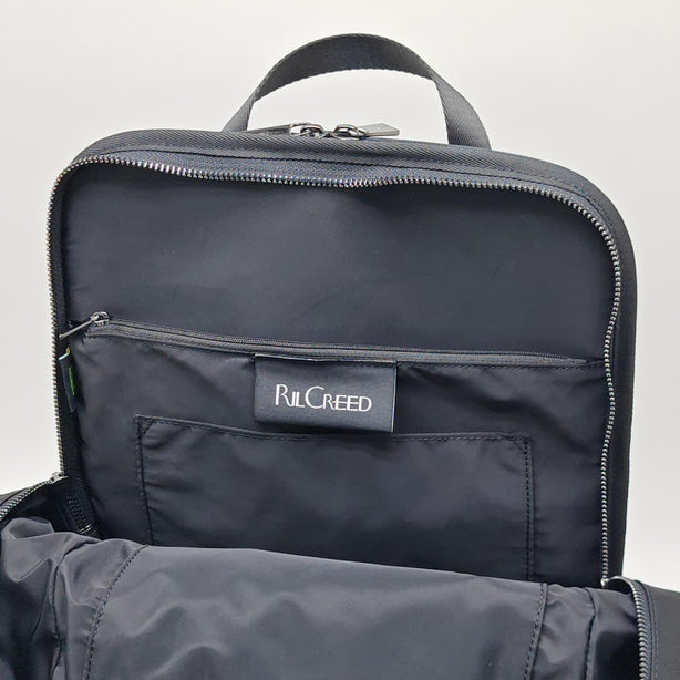 Ril Creed Polyester Backpack with front slip pocket, 2 side slip pockets and labtop compartment