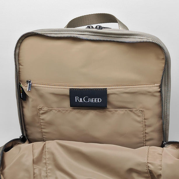 Ril Creed Polyester Backpack with front slip pocket, 2 side slip pockets and labtop compartment