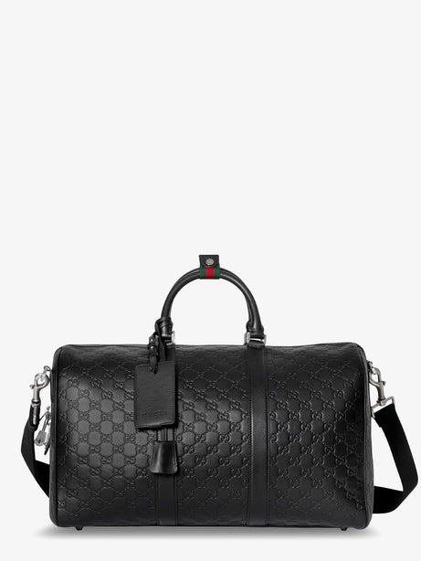 Gucci Coated canvas GG Emblem travel bag with GG motif - Black