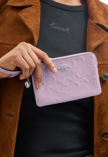 Coach Corner Zip Wristlet In Signature Leather With Heart Charm - Violet