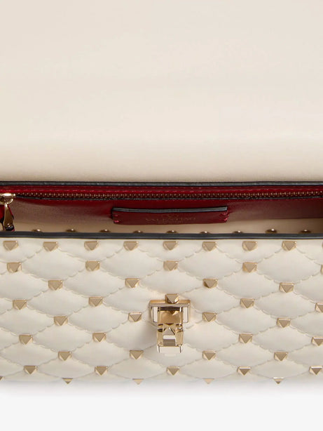 Valentino Garavani Rockstud Spike leather crossbody bag with iconic all-over studs - Lightivory