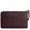 Coach Corner Zip Wristlet In Signature Canvas - Black Currant CEY93