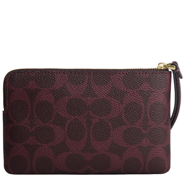 Coach Corner Zip Wristlet In Signature Canvas - Black Currant CEY93