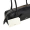 ALAIA Grained leather small 'Le Teckel' bag