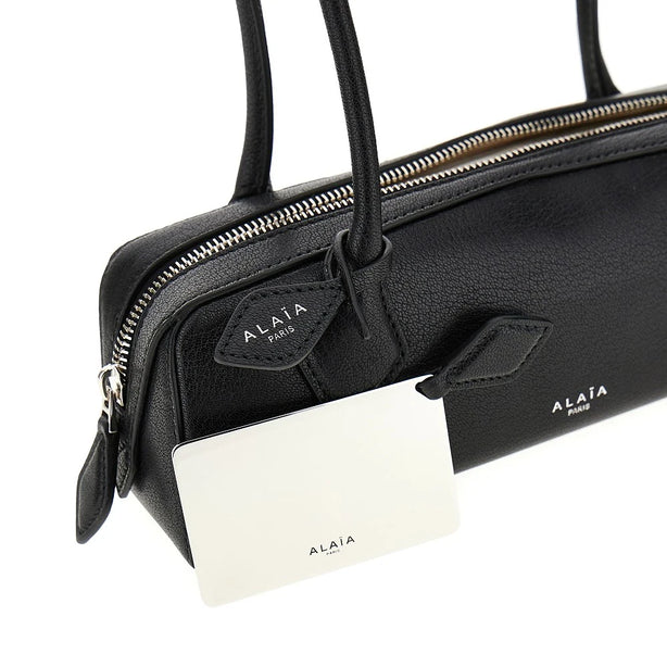 ALAIA Grained leather small 'Le Teckel' bag