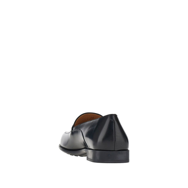 TODS Leather loafers with logo medal