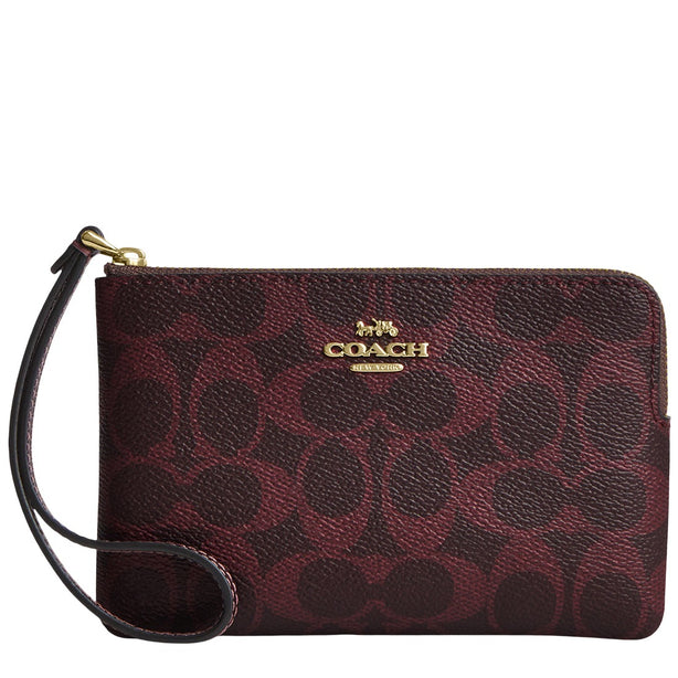Coach Corner Zip Wristlet In Signature Canvas - Black Currant CEY93