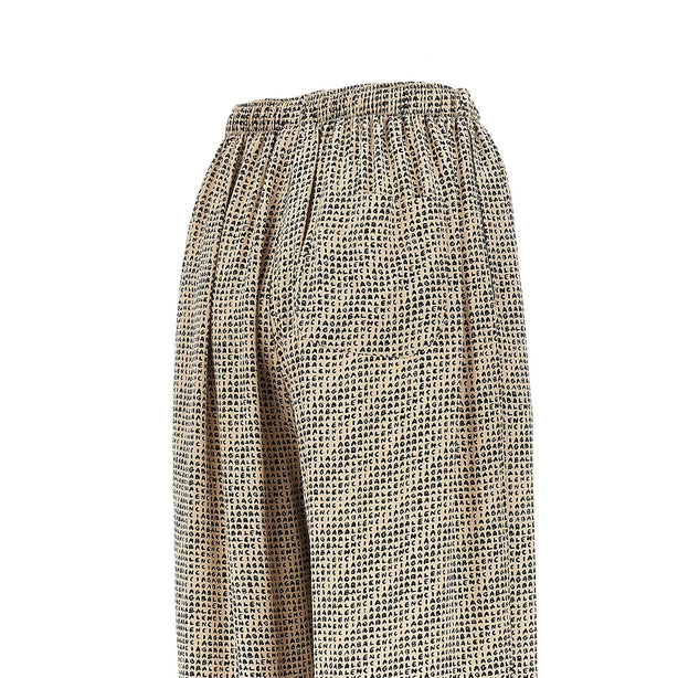 BALENCIAGA Silk pants with Monogram print